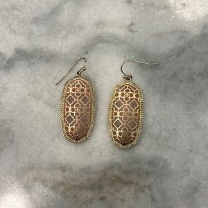 Kendra Scott rose gold and yellow gold earrings